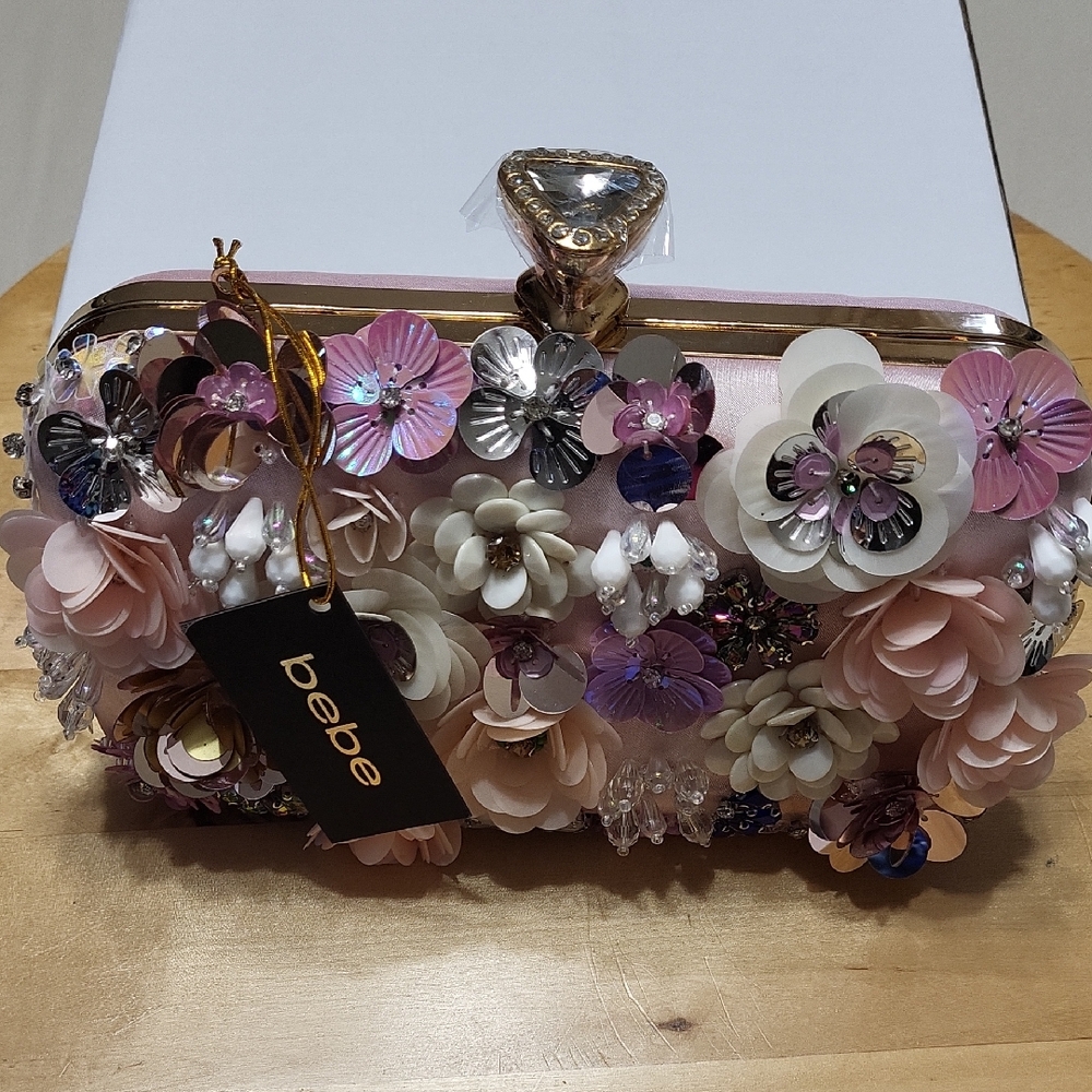 Bebe Pink and White Floral Clutch